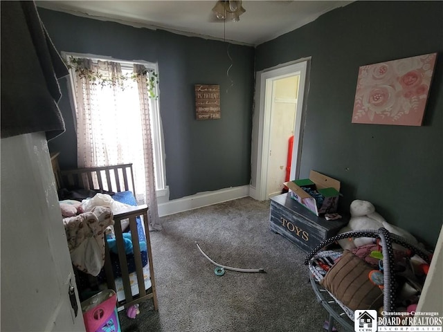 116 Park St, Jamestown, NY 14701 - carpeted bedroom featuring baseboards