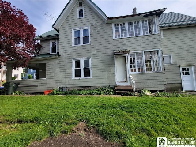 116 Park St, Jamestown, NY 14701 - view of front of home featuring entry steps and a front yard