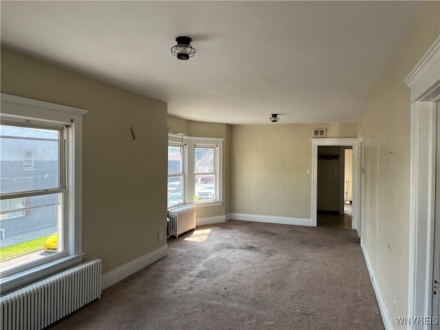 600 Cayuga Dr, Niagara Falls, NY 14304 - carpeted empty room featuring radiator heating unit