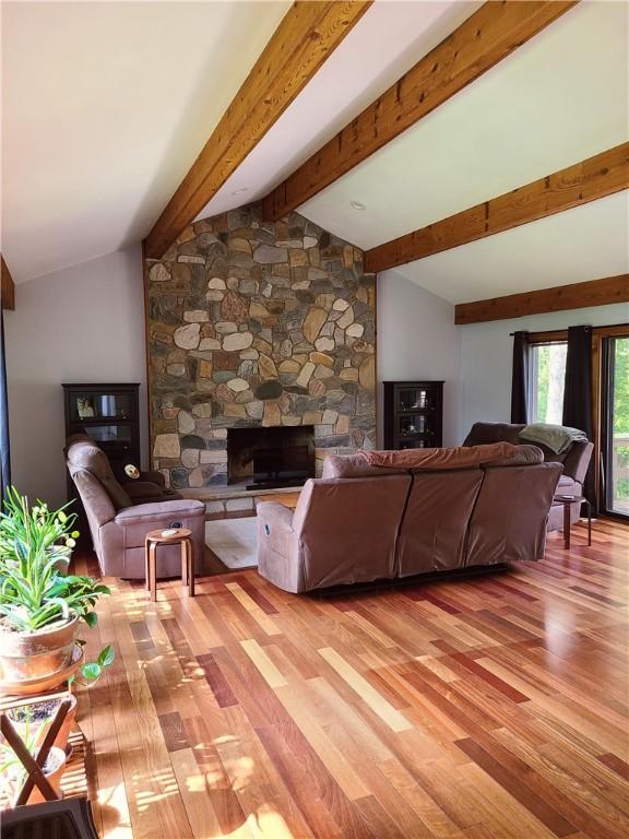 1324 New Seabury Ln, Victor, NY 14564 - living area with light wood-type flooring and a fireplace