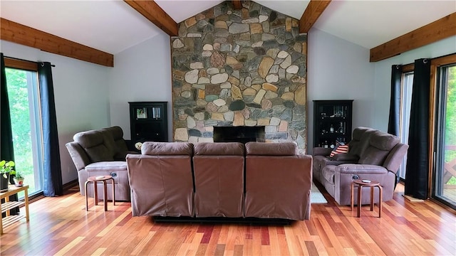 1324 New Seabury Ln, Victor, NY 14564 - living area featuring light wood-style floors, plenty of natural light, and a fireplace