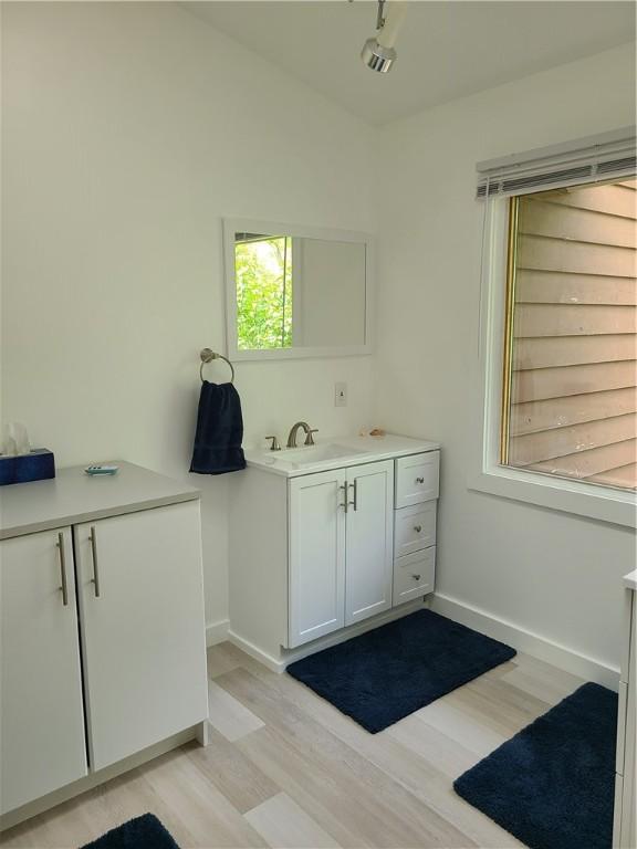 1324 New Seabury Ln, Victor, NY 14564 - bathroom with vanity and wood finished floors