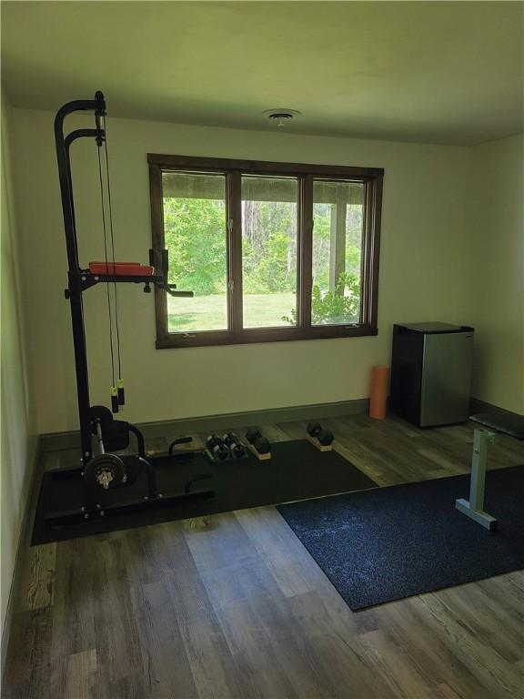 1324 New Seabury Ln, Victor, NY 14564 - exercise room with wood finished floors and baseboards