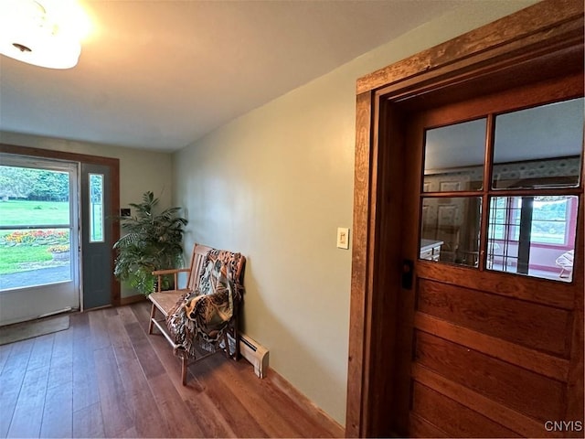 4076 State Highway 37, Morristown, NY 13669 - entryway with wood finished floors and a baseboard heating unit