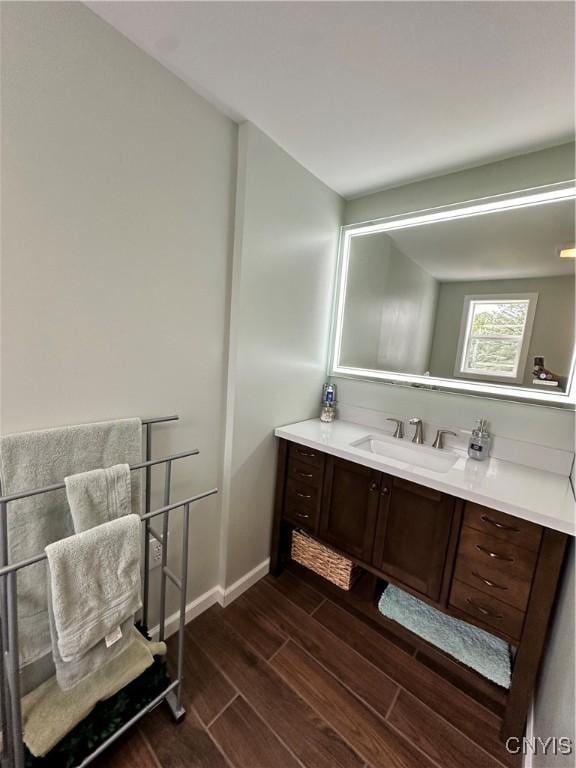 4076 State Highway 37, Morristown, NY 13669 - bathroom featuring wood finished floors and vanity