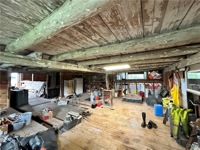 4076 State Highway 37, Morristown, NY 13669 - below grade area featuring wood ceiling, hardwood / wood-style flooring, and freestanding refrigerator