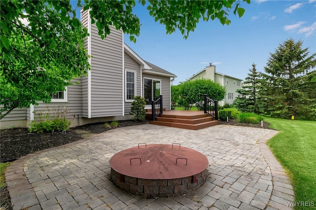 735 Pletcher Rd, Lewiston, NY 14092 - view of patio / terrace featuring a fire pit and a deck