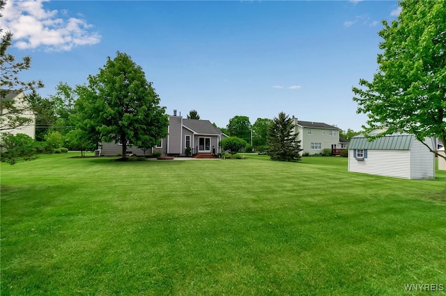 735 Pletcher Rd, Lewiston, NY 14092 - view of grassy yard with a storage unit