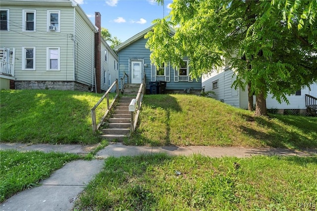 207 Boyden St, Syracuse, NY 13203 - view of front facade featuring stairs and a front yard