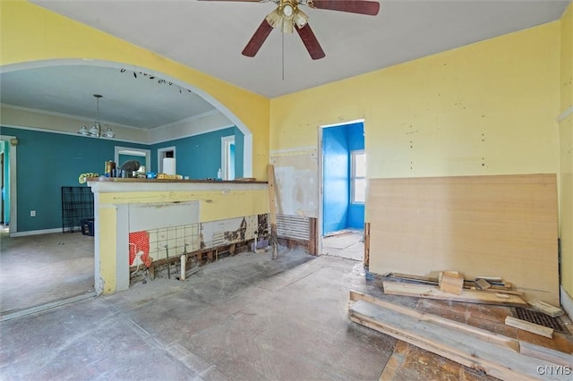 207 Boyden St, Syracuse, NY 13203 - misc room featuring ceiling fan, crown molding, and arched walkways