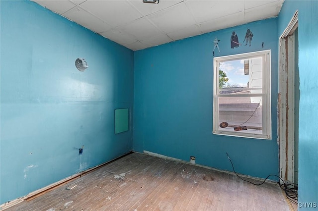 207 Boyden St, Syracuse, NY 13203 - empty room featuring hardwood / wood-style floors and a paneled ceiling