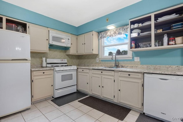 17 Hummingbird Pl, Clay, NY 13090 - kitchen with white appliances, open shelves, and light tile patterned flooring