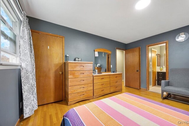 17 Hummingbird Pl, Clay, NY 13090 - bedroom with light wood-style floors and baseboards