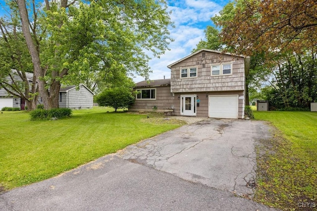 17 Hummingbird Pl, Clay, NY 13090 - split level home featuring driveway, a garage, and a front lawn