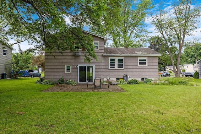 17 Hummingbird Pl, Clay, NY 13090 - back of house featuring a patio and a yard