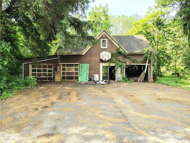 756 Herkimer Rd, Utica, NY 13502 - view of front of home featuring a garage