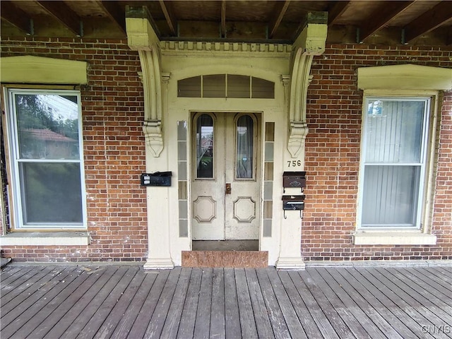 756 Herkimer Rd, Utica, NY 13502 - doorway to property featuring brick siding