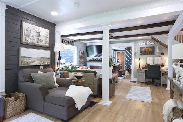 31768 Wilton Rd, Rutland, NY 13619 - living room featuring light wood-style flooring, ornate columns, beam ceiling, recessed lighting, and a desk