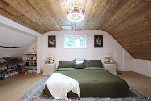 31768 Wilton Rd, Rutland, NY 13619 - bedroom with wood ceiling, a decorative wall, lofted ceiling, and wood finished floors