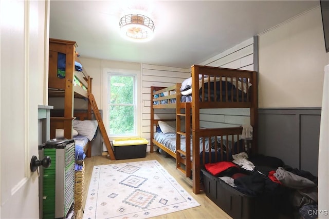 31768 Wilton Rd, Rutland, NY 13619 - bedroom featuring a decorative wall and wood finished floors