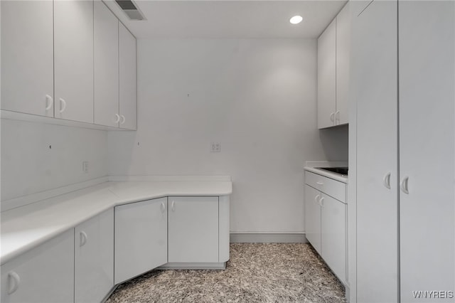 40 Waterfront Cir, Buffalo, NY 14202 - kitchen featuring white cabinets, light countertops, and recessed lighting