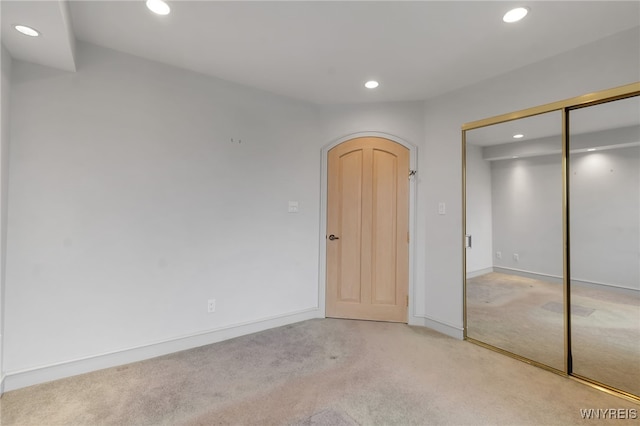 40 Waterfront Cir, Buffalo, NY 14202 - unfurnished bedroom with recessed lighting, light carpet, and a closet