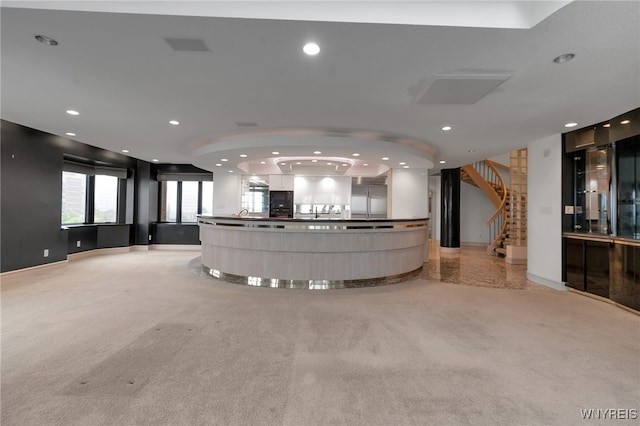 40 Waterfront Cir, Buffalo, NY 14202 - welcome area with recessed lighting, stairway, and a community bar