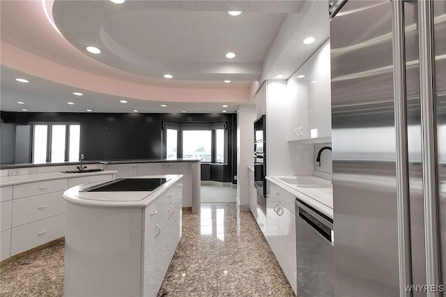 40 Waterfront Cir, Buffalo, NY 14202 - kitchen with appliances with stainless steel finishes, modern cabinets, granite floors, recessed lighting, and white cabinetry