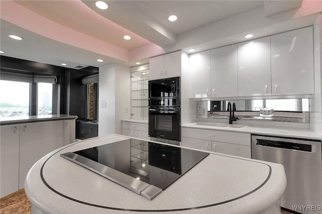 40 Waterfront Cir, Buffalo, NY 14202 - kitchen featuring black appliances, white cabinetry, recessed lighting, light countertops, and modern cabinets