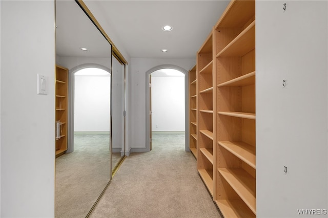 40 Waterfront Cir, Buffalo, NY 14202 - corridor with arched walkways, light carpet, and recessed lighting