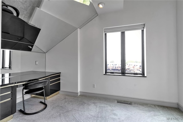 40 Waterfront Cir, Buffalo, NY 14202 - unfurnished living room featuring carpet floors, lofted ceiling, and a desk