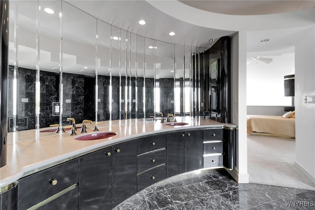 40 Waterfront Cir, Buffalo, NY 14202 - full bath with ensuite bath, marble tiled floors, double vanity, and recessed lighting