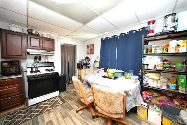 377 Pine Ridge Rd, Cheektowaga, NY 14225 - dining room with a drop ceiling and wood finished floors