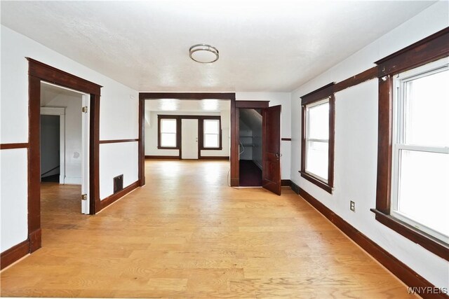 377 Pine Ridge Rd, Cheektowaga, NY 14225 - hall featuring light wood-type flooring and baseboards