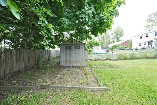 377 Pine Ridge Rd, Cheektowaga, NY 14225 - fenced backyard featuring a storage shed