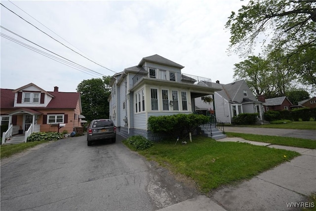 377 Pine Ridge Rd, Cheektowaga, NY 14225 - view of front of house featuring a balcony and driveway