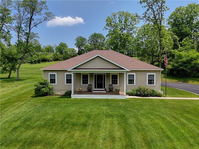 4338 State Route 90, Springport, NY 13160 - rear view of property with covered porch, a yard, and view of scattered trees