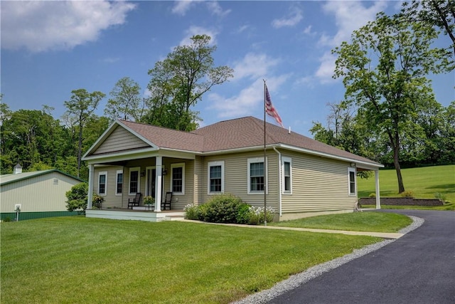 4338 State Route 90, Springport, NY 13160 - view of front of property featuring covered porch and a front yard