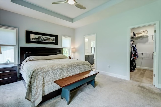 4338 State Route 90, Springport, NY 13160 - carpeted bedroom with a spacious closet, multiple windows, a closet, and connected bathroom