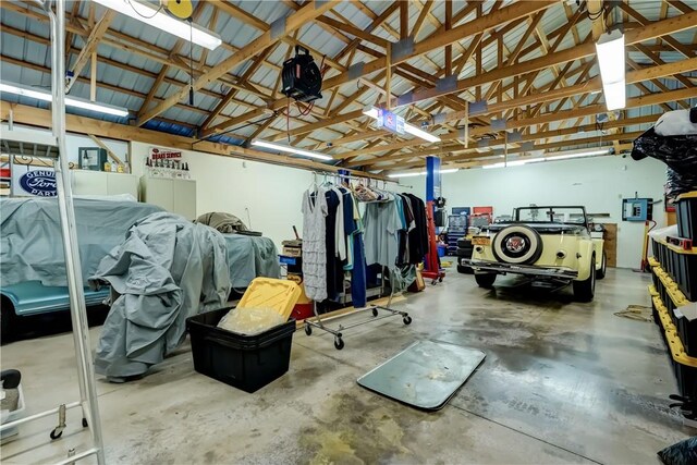 4338 State Route 90, Springport, NY 13160 - garage featuring a garage door opener