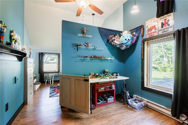 3839 Thompson Ave, Castile, NY 14549 - bar with vaulted ceiling, ceiling fan, and wood finished floors