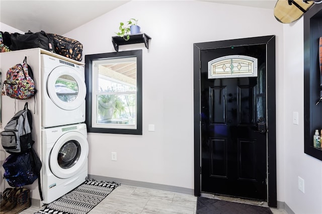 3839 Thompson Ave, Castile, NY 14549 - laundry room with stacked washing machine and dryer and baseboards