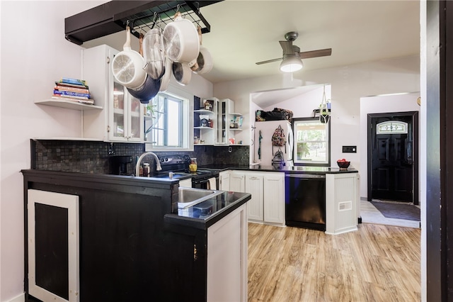 3839 Thompson Ave, Castile, NY 14549 - kitchen featuring black appliances, open shelves, dark countertops, white cabinets, and light wood-style flooring