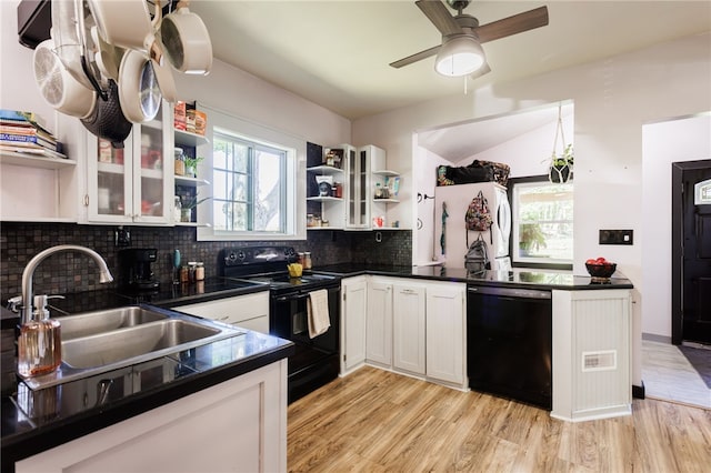 3839 Thompson Ave, Castile, NY 14549 - kitchen with black appliances, open shelves, dark countertops, backsplash, and white cabinets