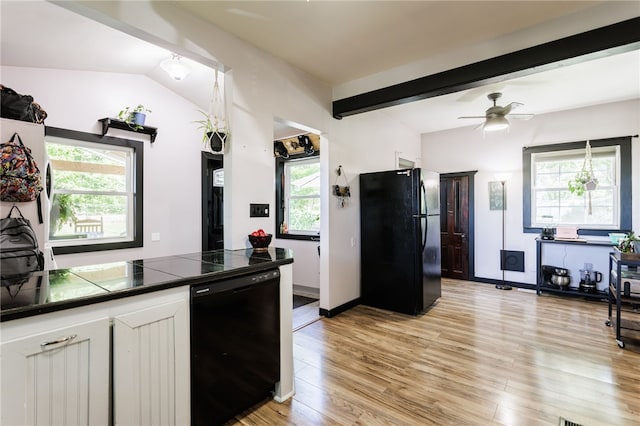 3839 Thompson Ave, Castile, NY 14549 - kitchen with black appliances, tile countertops, light wood-style floors, white cabinetry, and ceiling fan