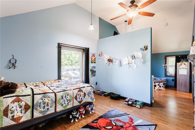 3839 Thompson Ave, Castile, NY 14549 - bedroom featuring high vaulted ceiling and wood finished floors