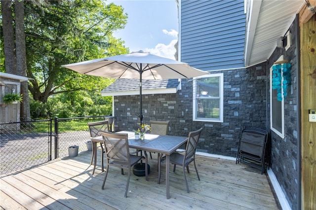 3839 Thompson Ave, Castile, NY 14549 - wooden terrace featuring outdoor dining space