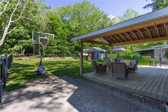 3839 Thompson Ave, Castile, NY 14549 - view of patio with a wooden deck, a storage unit, and outdoor dining space