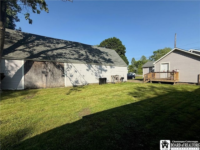 421 E Connell St, Olean-City, NY 14760 - view of green lawn featuring a wooden deck