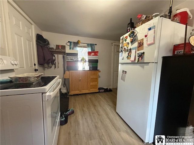 421 E Connell St, Olean-City, NY 14760 - kitchen with white appliances and light wood-type flooring